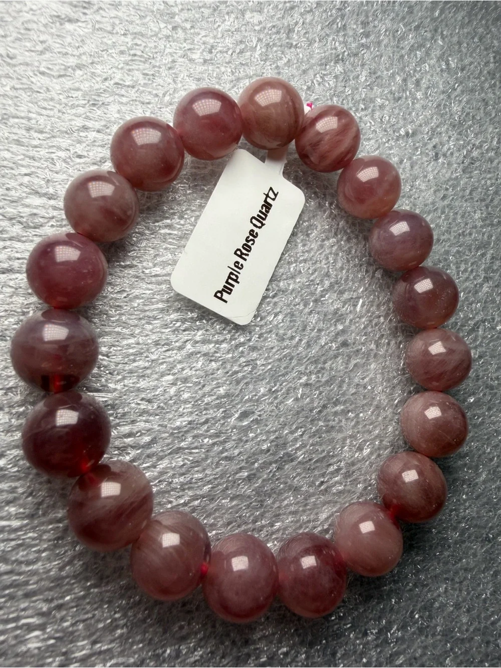 N/A unpaid que rhodonite